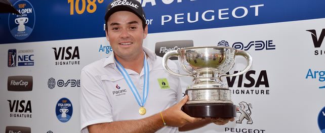 BUENOS AIRES, ARGENTINA - DEC. 8, 2013: Marcelo Rozo of Colombia poses with the trophy as champion of the 108th VISA Open de Argentina presented by Peugeot at Nordelta Golf Club. / El colombiano Marcelo Rozo posa con el trofeo tras su victoria en el 108° VISA Open de Argentina presentado por Peugeot la tarde de este domingo en Nordelta Golf Club.
