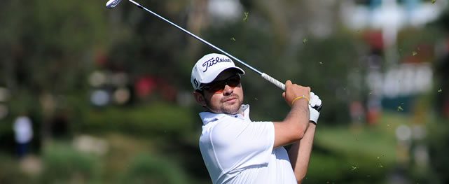 GUADALAJARA, MEXICO - MAR. 22, 2014: El colombiano Marcelo Rozo durante la tercera ronda del TransAmerican Power Products CRV Open en Las Lomas Club de Golf. / Colombia's Marcelo Rozo during the third round of the TransAmerican Power Products CRV Open at Las Lomas Club de Golf.