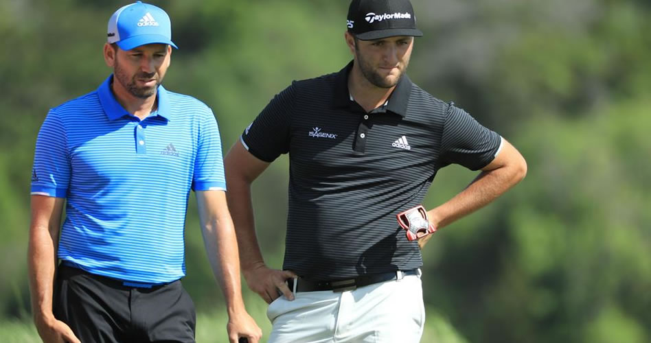 Los golfistas españoles Sergio García y Jon Rahm (Richard Heathcote / AFP)